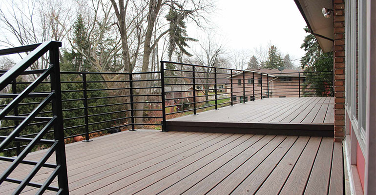 Composite wood deck boards